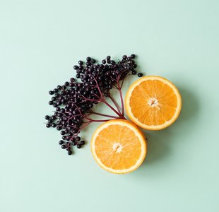 rundes Bild: Holunder und Orange